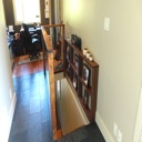 Custom Built Railing with Glass and Stair Wall Shelving - With Walnut Finish